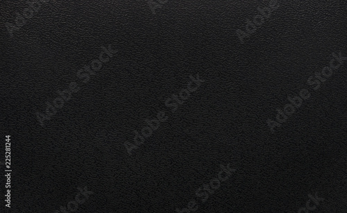Black plastic texture background. Dark rough material in pvc object.