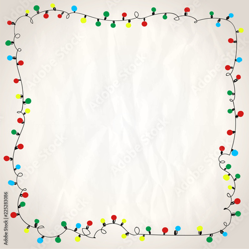 Simple frame with garland lights against paper background