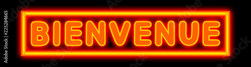 Bienvenue - glowing text on black background photo