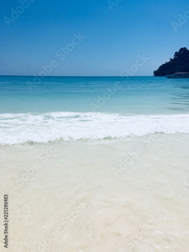 plage mer turquoise sable blanc