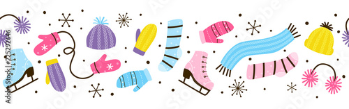 Seamless border with winter clothes