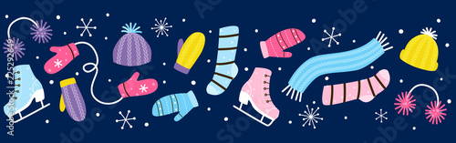 Seamless border with winter clothes