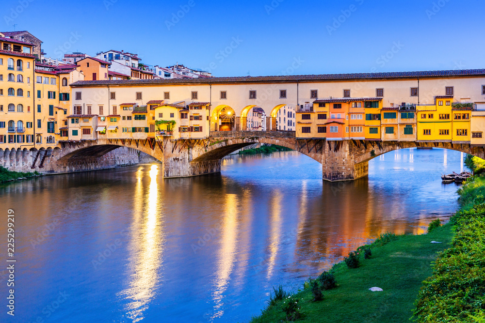 Florence, Italy. Ponte Vecchio bridge over Arno river.