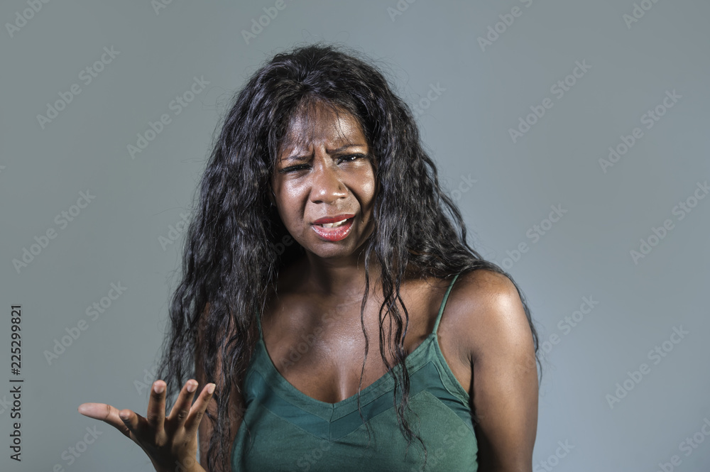 young beautiful and stressed black African American woman feeling upset and angry gesturing agitated and pissed looking crazy and furious arguing or having dispute young beautiful and stressed black African American woman feeling upset and angry gesturing agitated and pissed looking crazy and furious arguing or having dispute