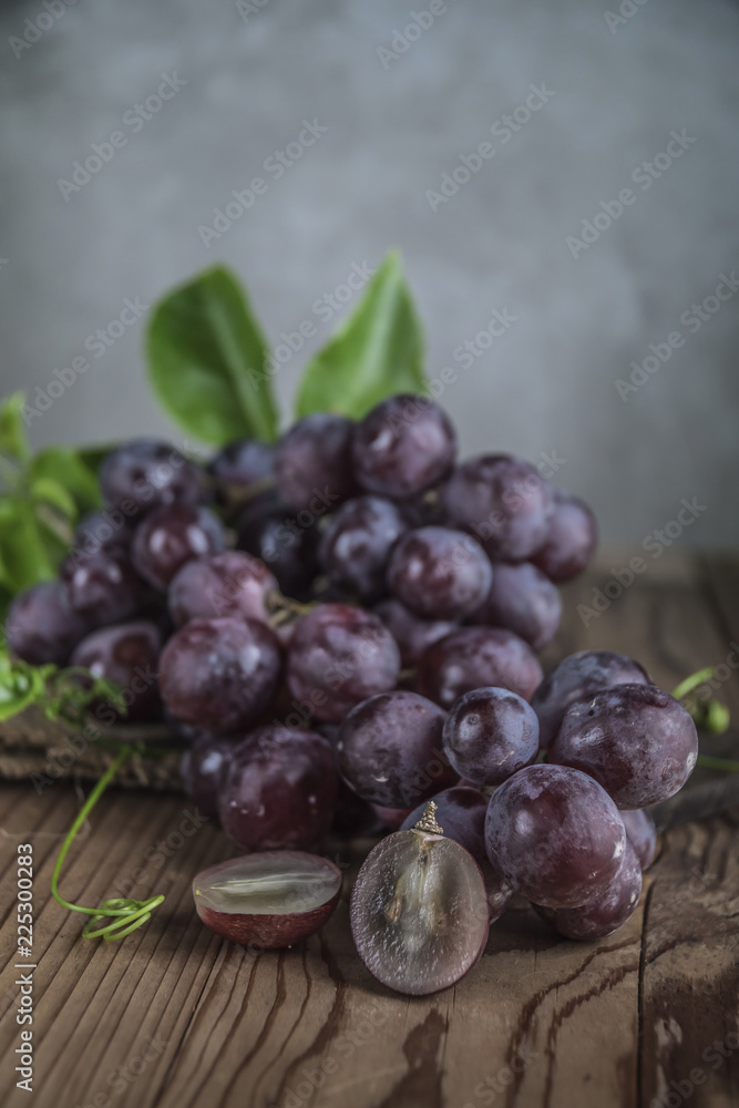 Fototapeta premium Healthy fruits Red grapes in the vineyard,