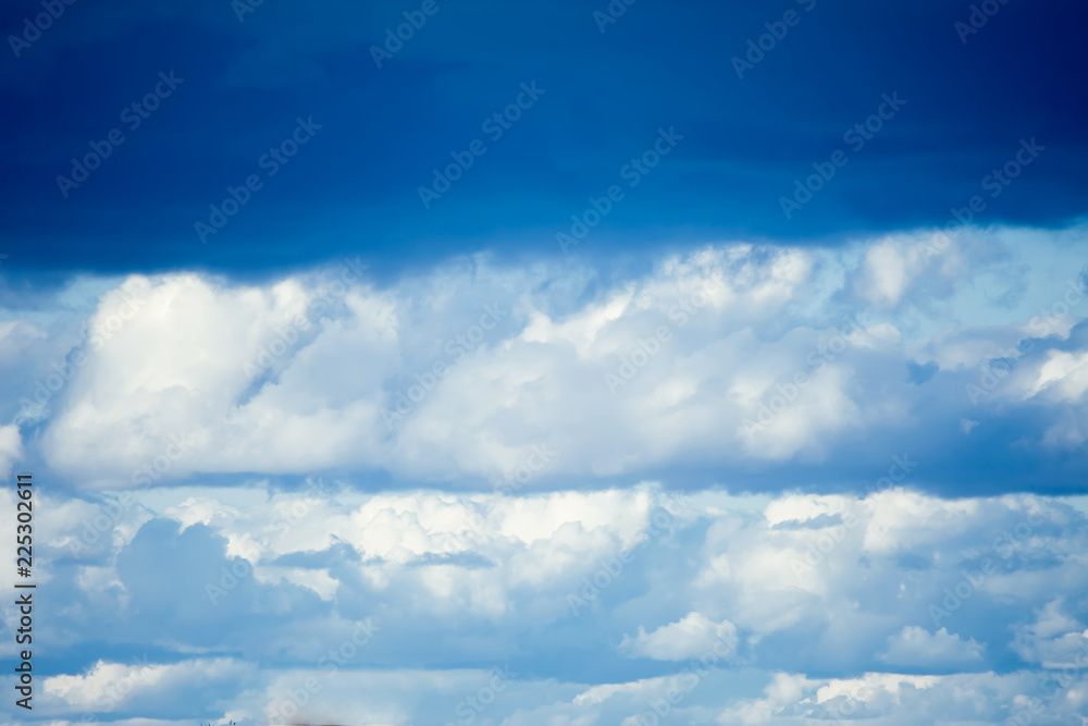 Obraz premium Beautiful clouds with blue sky background. Nature, weather and sun