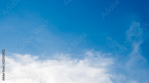 Clouds and dark blue sky background