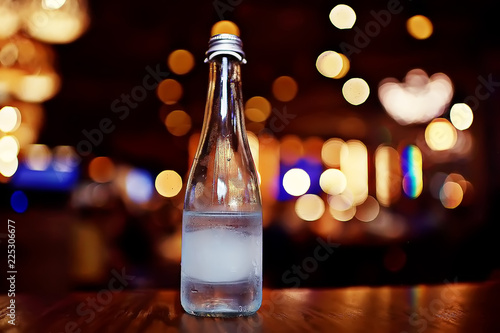 bottle of mineral water in the restaurant bokeh
