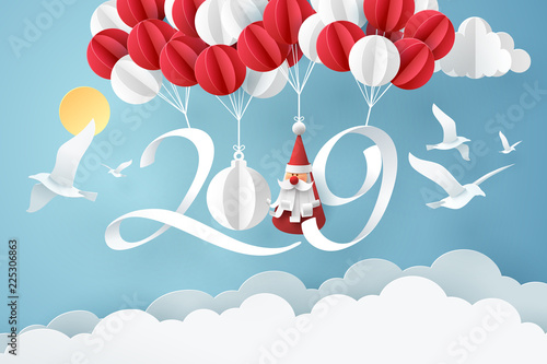Paper art of 2019 hang with balloon in the sky, happy new year celebration concept