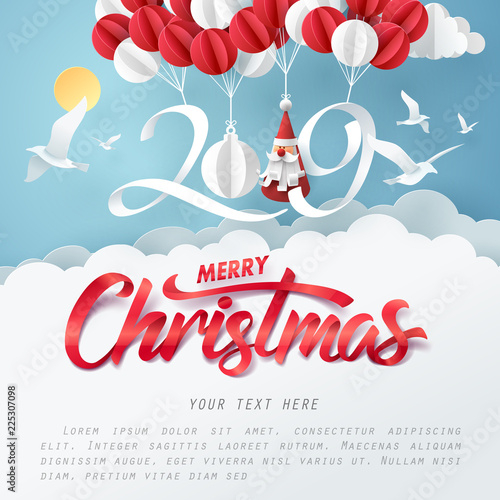 Paper art of 2019 hang with balloon in the sky, merry Christmas and happy new year celebration concept