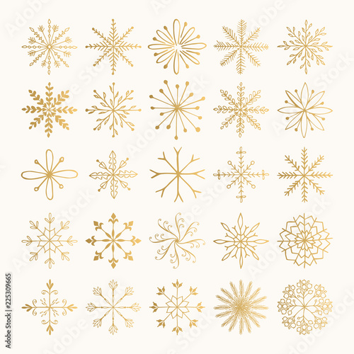 Set of hand drawn golden snowflakes