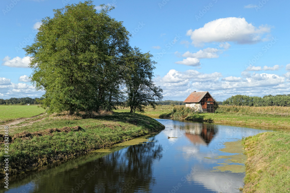 Weir and House on Havel river canal in Brandenburg (Germany)