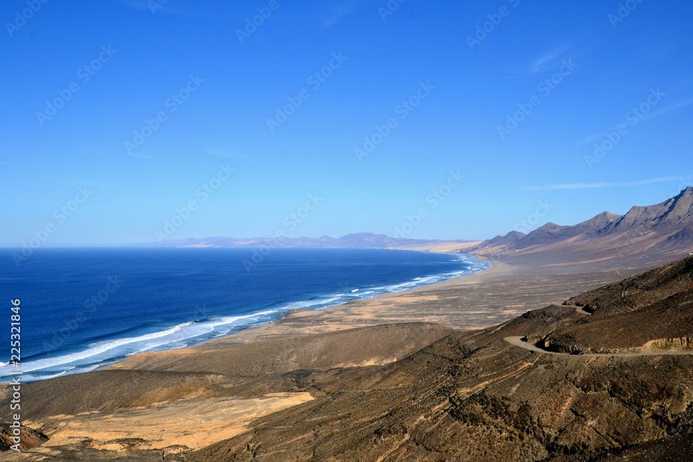 Southwest part of Fuerteventura. Road to the Cofete beach leading through the mountains. Fuerteventura, Canary Islands, Spain, Europe Southwest part of Fuerteventura. Road to the Cofete beach leading through the mountains. Fuerteventura, Canary Islands, Spain, Europe