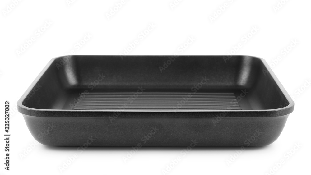Black iron empty grill pan on a white background Black iron empty grill pan on a white background