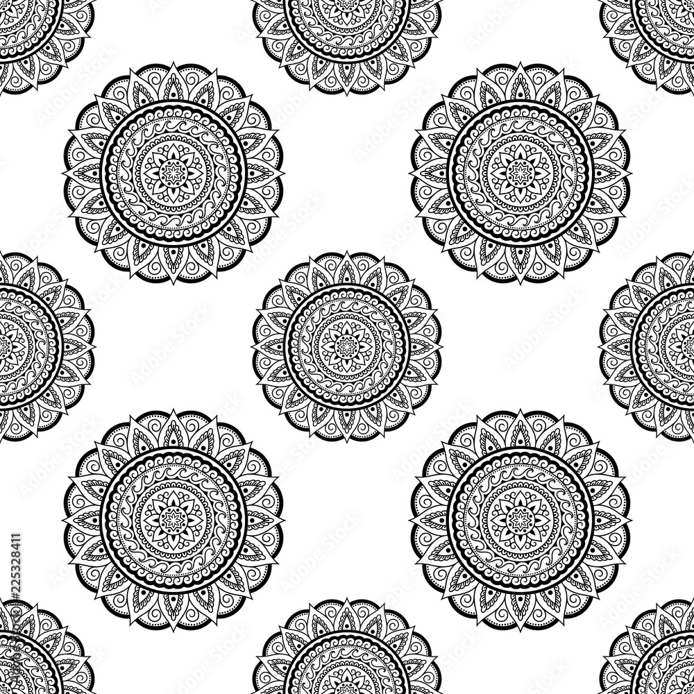 Seamless decorative ornament in ethnic oriental style. Circular pattern in form of mandala for Henna, Mehndi, tattoo, decoration.