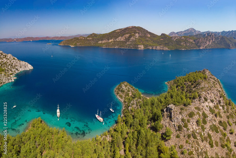 Fototapeta premium Aerial view of boats in Selimiye Cove in Turkey during Blue Voyage