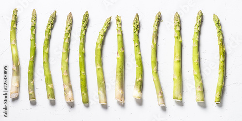 Fresh green asparagus on white background.