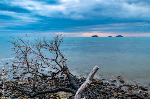 Long exposure photo of dramatic sky and ocean during sunset   blue hour  in a beach in Ko Chang  Thailand