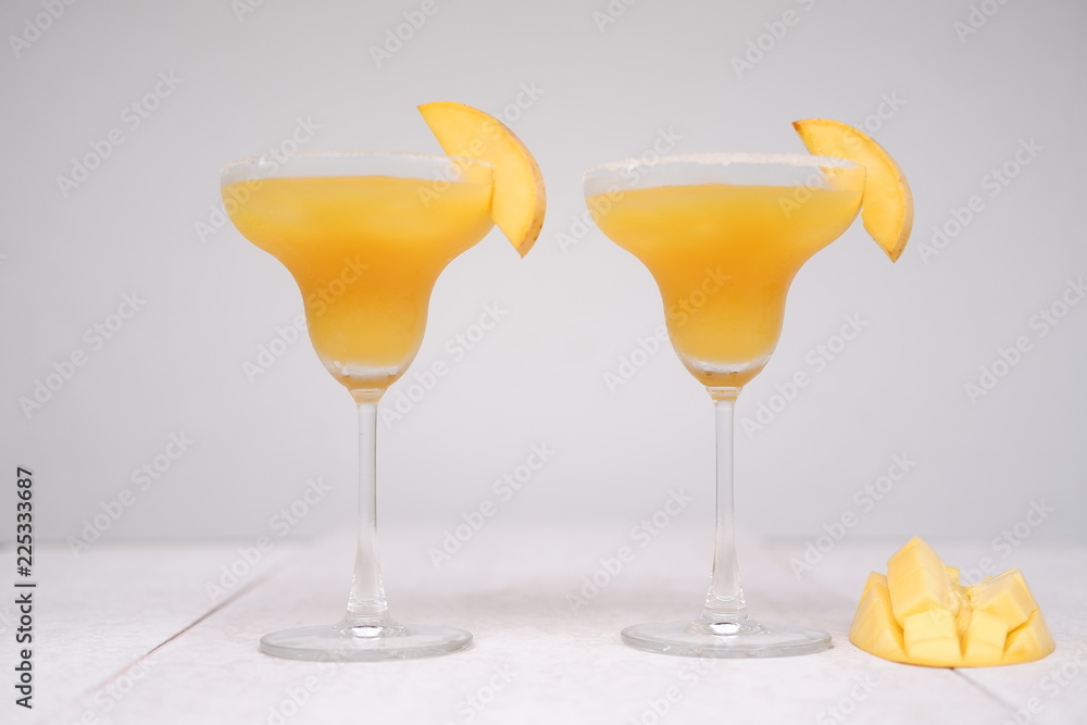 mango margarita cocktail on table