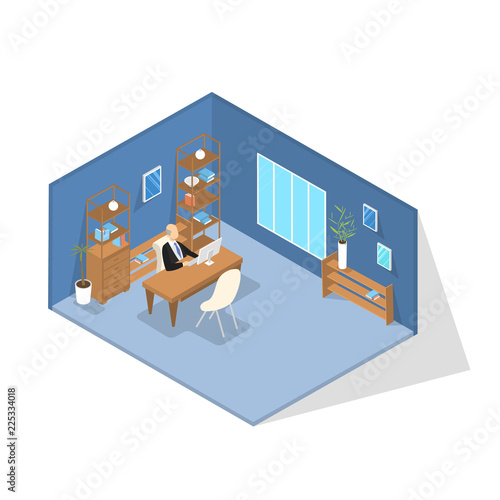 School principal sitting in his office and working
