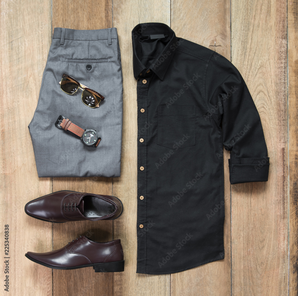 Men's casual outfits for man clothing with office shoes , watch, trousers, black  shirt, and sunglasses on wooden background, Top view Photos | Adobe Stock