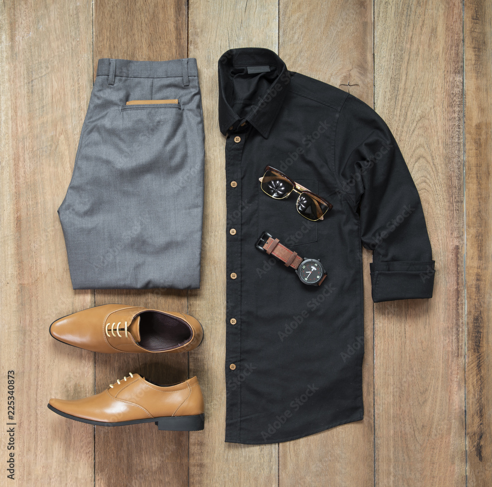 Men's casual outfits for man clothing with office shoes , watch, trousers,  black shirt, wallet and sunglasses on wooden background, Top view  Stock-Foto | Adobe Stock