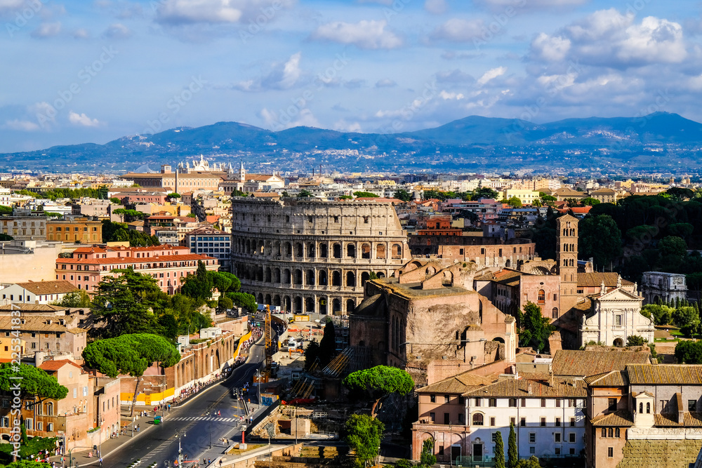 Beautiful evening panorama of Rome and Ancient Coliseum