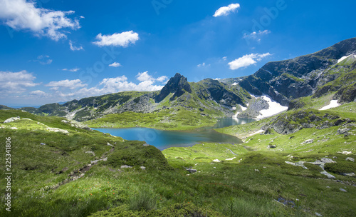 The Seven Rila Lakes - an incredible creation of nature in Rila mountain, Bulgaria. One of the most visited places of tourists and top landmark. Sightseeing with green and blue colors. Panorama view