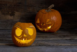 Glowing Halloween pumpkin. Traditional Jack-O-Lantern. Autumn holiday background.