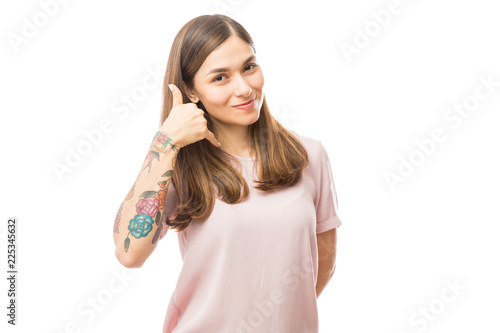 Woman Showing Call Me Gesture Against White Background