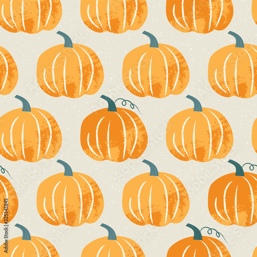 Seamless pattern with pumpkin in pastel colors. Hand drawn colorful vector illustration. Craft stamp style. Halloween or harvest background.