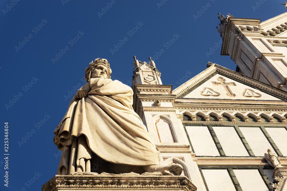 Fototapeta premium Dante Alighieri statue in Santa Croce square in Florence, Italy