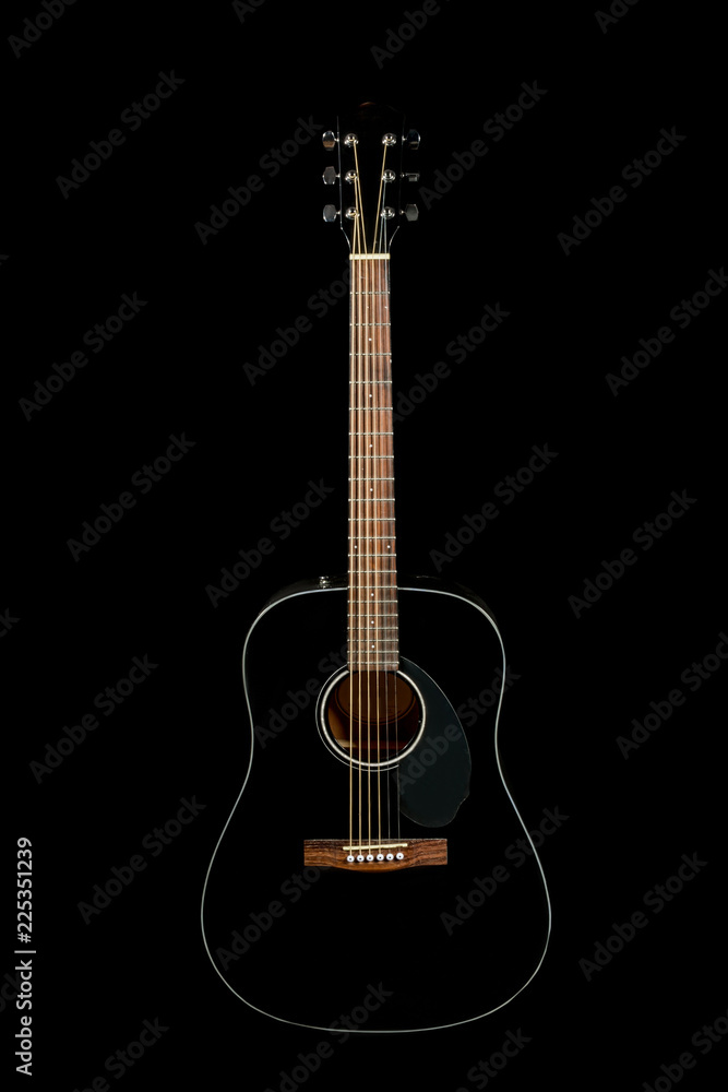 acoustic guitar on a black background