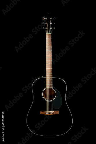 acoustic guitar on a black background