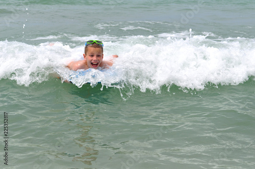 Photography Coming in on a Wave and a Boogie Board