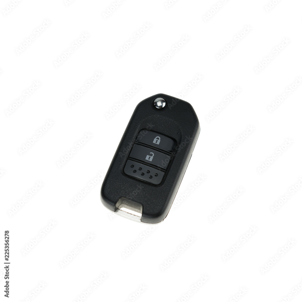 Remote control and car key isolated on white background Remote control and car key isolated on white background