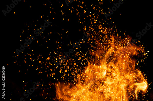 Photo Fire sparks with flames on black background
