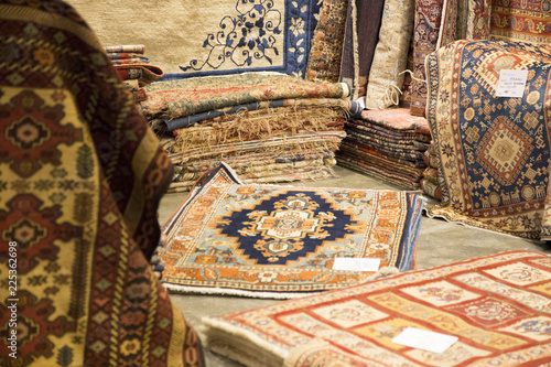 image of oriental carpets sold at a craft fair