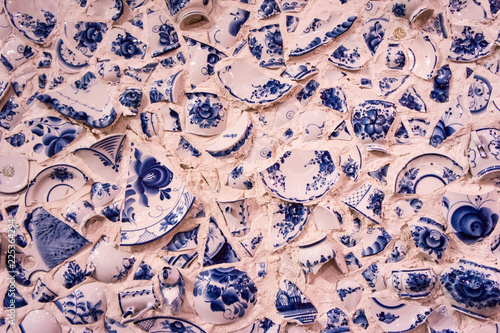 The bulk texture of a wall of broken ceramic ware
