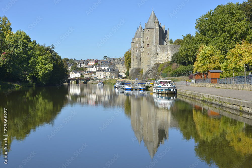 Castle of Rohan on the banks of Oust, part of canal Nantes at Brest, at Josselin, a commune in the Morbihan department in Brittany in north-western France