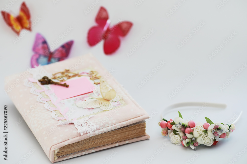 A diary for entries on a white table A diary for entries on a white table