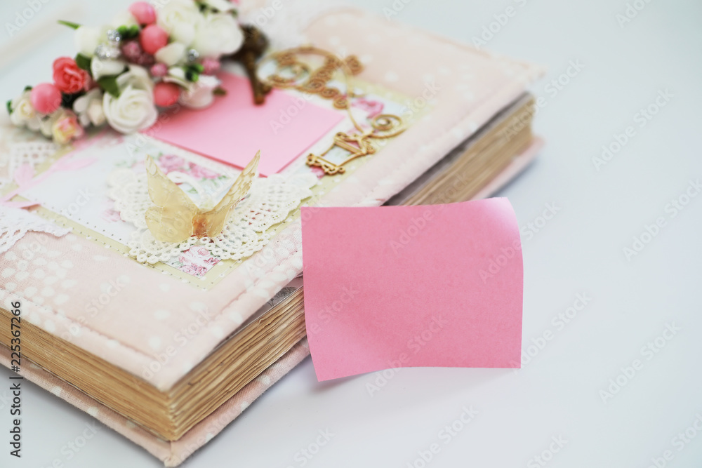 A diary for entries on a white table A diary for entries on a white table
