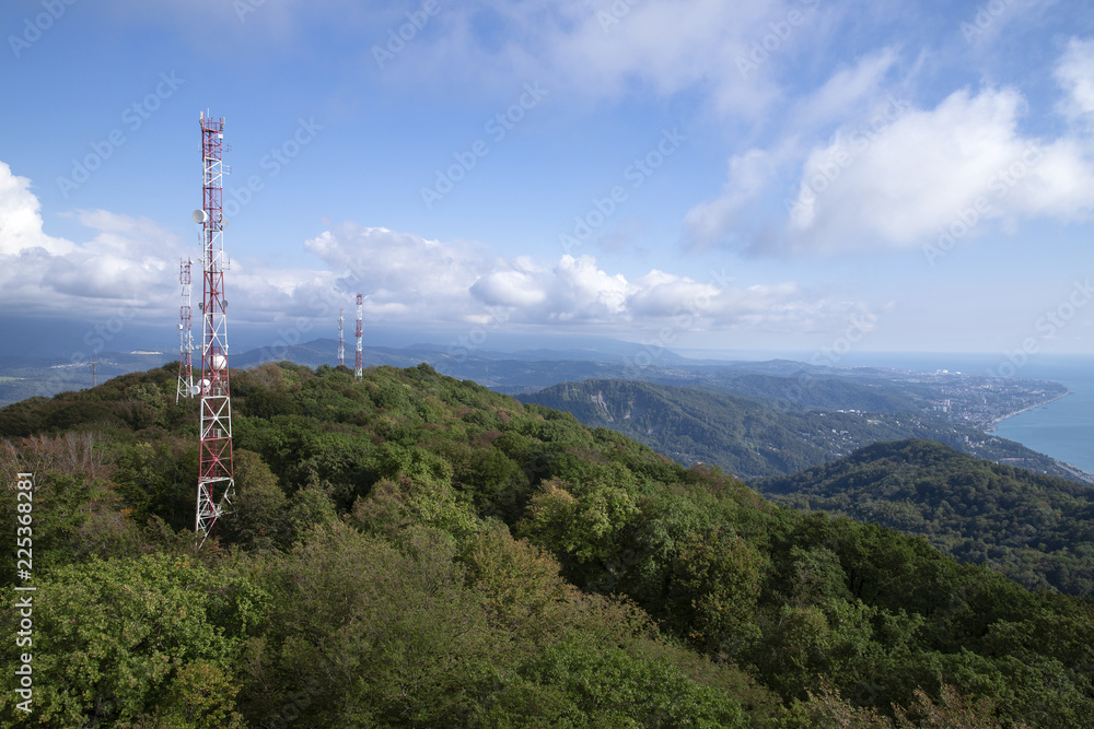 Metal structures on the top of high mountain above clouds Metal structures on the top of high mountain above clouds