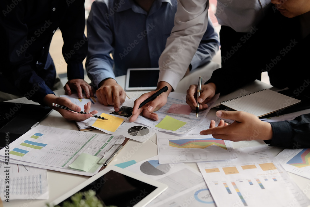 Business partner meeting and discussion with tablet and report finance paper on office desk. Business partner meeting and discussion with tablet and report finance paper on office desk.