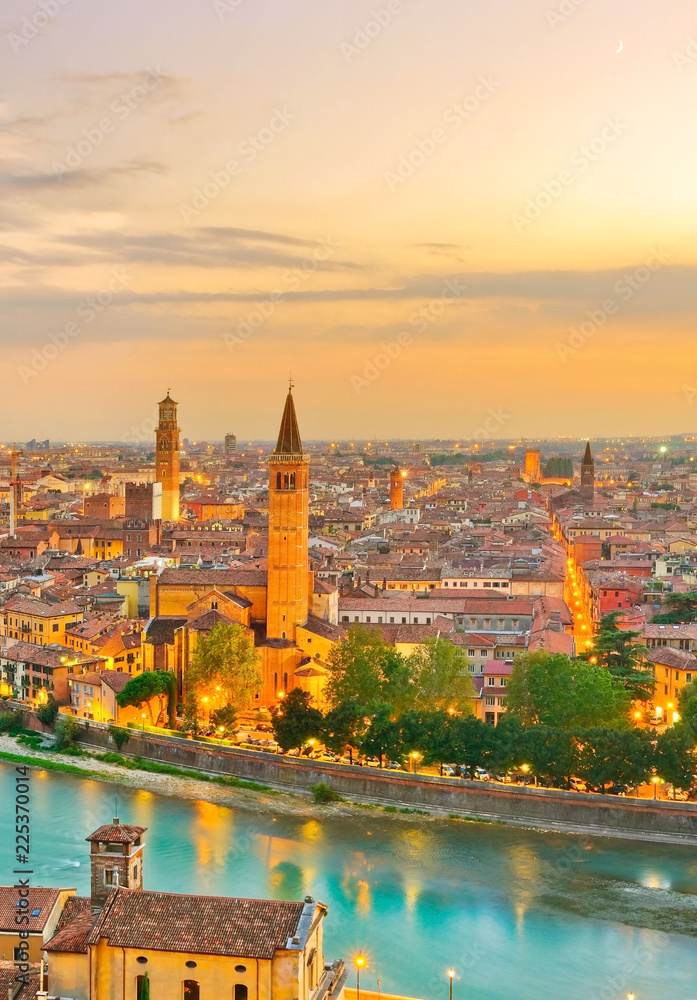 Naklejka premium View of the historic city center along Adige river at sunset in Verona, Italy.