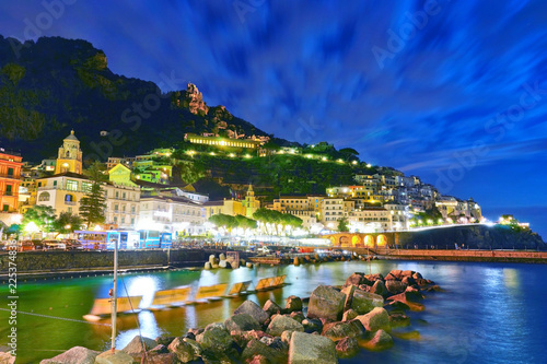 View of Amalfi village along Amalfi Coast in Italy at night.