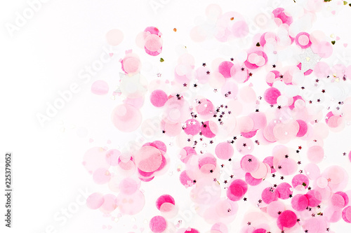 Background of pale pink paper confetti, holiday concept