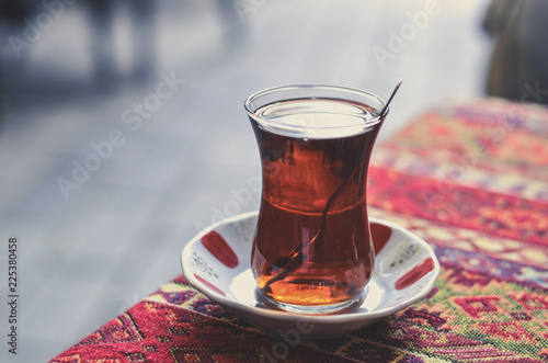 Turkish tea with bokeh background with filter effect photo