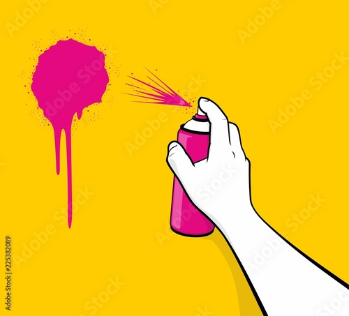 Man hand using pink spray painting
