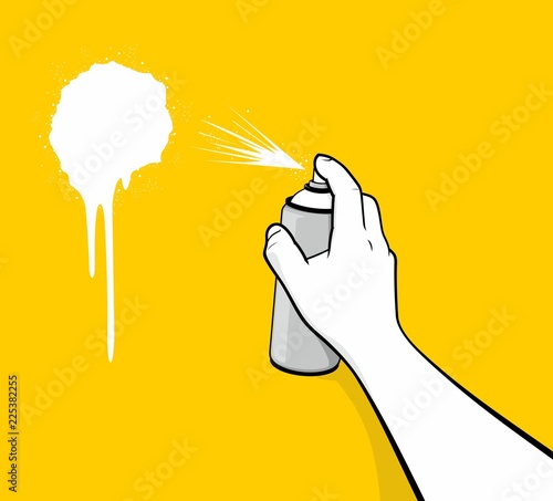 Man hand using white spray painting